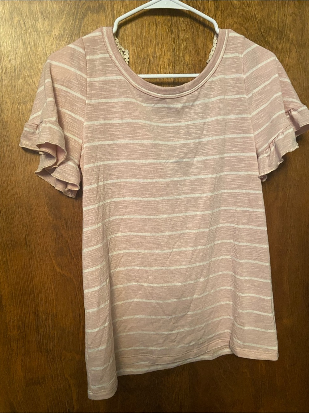 Cute blouse back is open great with a bralette .